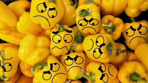 Obraz na płótnie draw on the fruit with facial expressions of one happy and the other angry