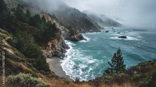 Misty Pacific Coastline Rugged cliffs with wild ocean, and dramatic foggy mountains.