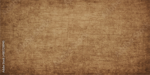 A worn vintage parchment background with an aged brown grunge paper texture and stained antique canvas material