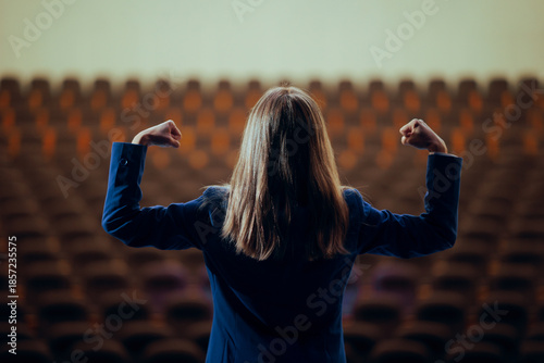Vászonkép Strong Woman Flexing her Arms Ready to Speak in Public