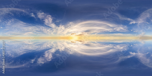 фотографія Golden Sunrise Over A Vast Cloudscape Reflected On A Glassy Ocean Surface In Blu