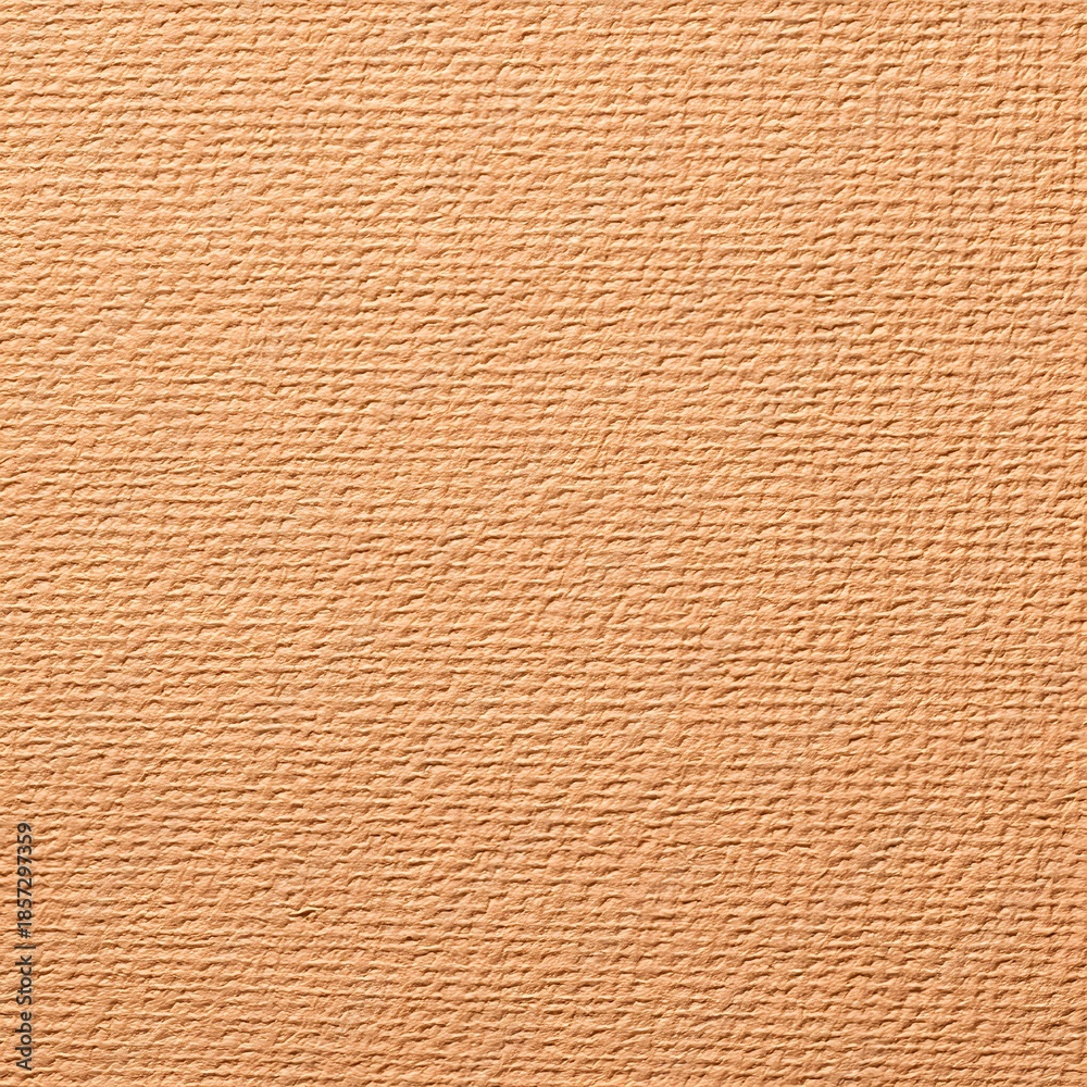 Fototapeta premium Close up of a textured light brown woven fabric surface showing intricate horizontal and vertical threads creating a subtle pattern perfect for backgrounds and design elements