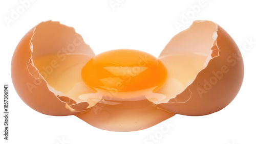 Fotografie Cracked egg with yolk isolated PNG on transparent background, broken shell halve
