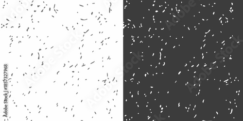 A split monochrome image with random dark specks on white and black