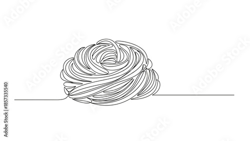 Classic spaghetti in a tangled pile on white background  