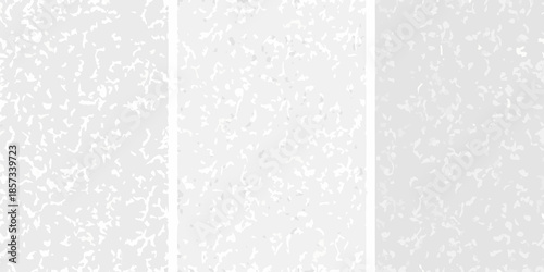Abstract white textured background with three vertical panels and subtle variations