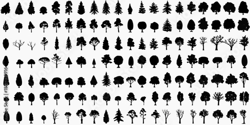 A collection of various black silhouette tree shapes and designs arranged densely