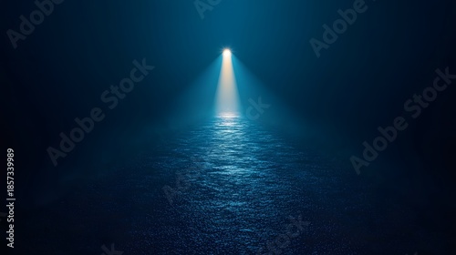 A glowing blue light bulb shines beneath the deep ocean surface, creating a dark underwater motion design where energy and beams of light flash through the blue water