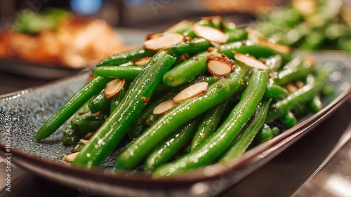 Fresh green beans sautéed to perfection, lightly crisp and tossed with toasted almonds. Experience a delightful burst of flavor in every bite, perfect for any meal.