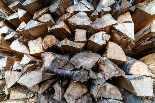 Wide angle shot, huge pile of beech firewood close up.
