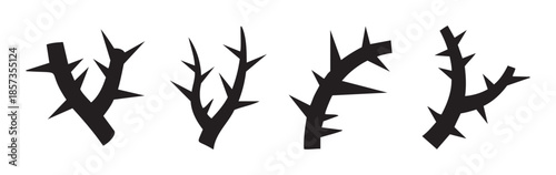 Stylized black thorny branches with sharp spikes form a collection of natural danger symbols, offering a stark and impactful graphic element for design projects.