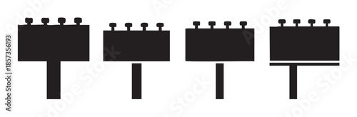 Four black silhouette advertising billboards with support poles and lights stand in a row, representing outdoor marketing and promotion.