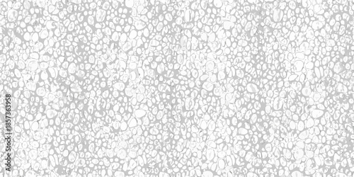 A grayscale textured background of many small rounded pebble like shapes