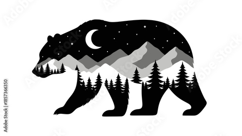 Silhouette of a Bear with a Mountain Landscape Inside.