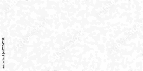 Abstract white background with scattered dark speckles and grainy texture