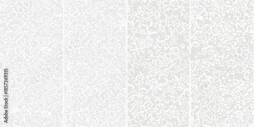 Intricate floral pattern on a light gray and white background texture
