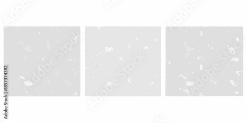 Three gray panels featuring scattered white speckles against a light backdrop