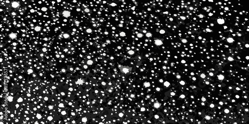 A dark background with scattered bright white spots resembling snowfall or stars