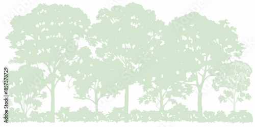 A serene silhouette of trees forming a lush peaceful forest landscape