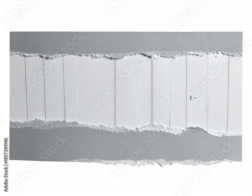 Torn paper reveals white stripes against a gray background