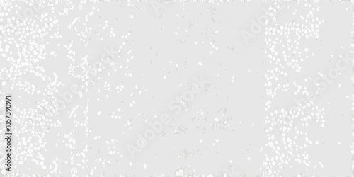 Abstract white background with scattered delicate speckled texture across the frame