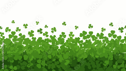 A dense field of green shamrocks and clovers with a white background.