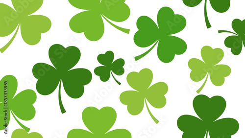 A vibrant pattern of various shades of green shamrocks scattered across a clean white background, evoking a festive St. Patrick's Day theme.