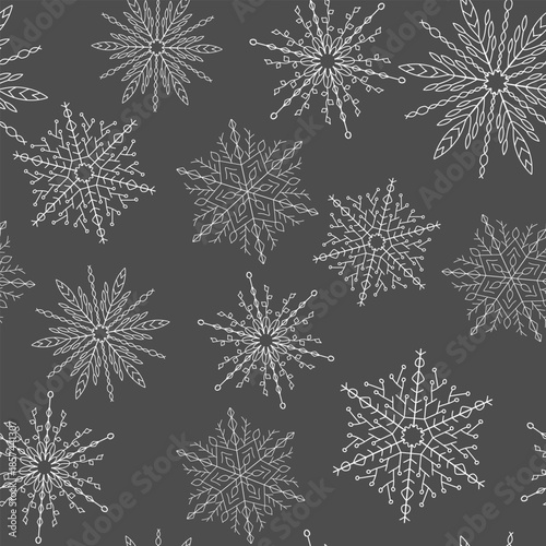 Christmas, New Year seamless pattern, linear illustration. snow flakes in the cold season, snowfall. Festive black and white repeating background.