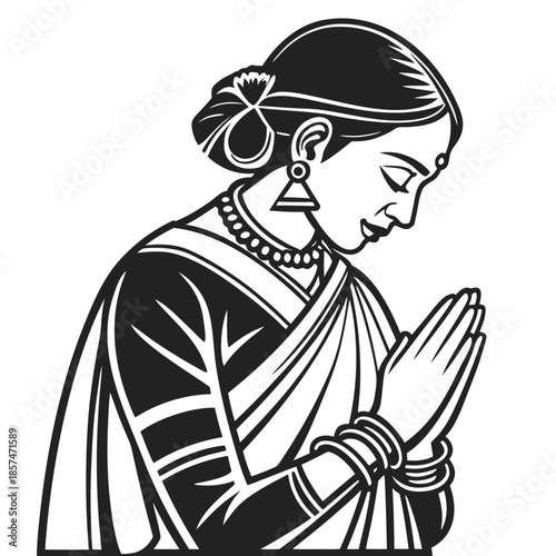 a woman in traditional Indian attire, wearing a saree and jewelry, with her hands pressed together in a namaste gesture. Her head is slightly bowed, conveying respect and greeting.