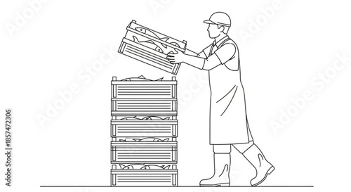 Worker stacking fish crates in a warehouse during a busy day  