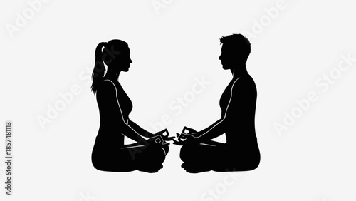 Silhouette of Couple Meditating Together Peacefully.