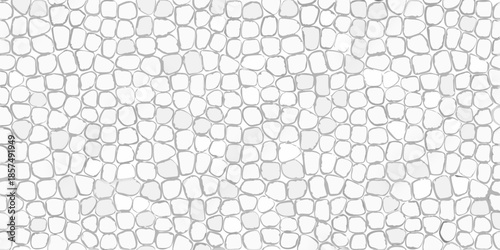 A seamless pattern of closely packed irregular gray and white stones