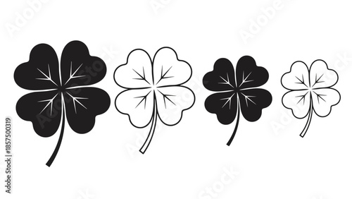 A collection of four-leaf clovers, some filled in black and others outlined in white, symbolizing luck.