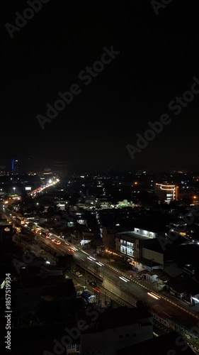 Wallpaper Mural Vertical hyperlapse video of city lights at night. Video taken from a height Torontodigital.ca