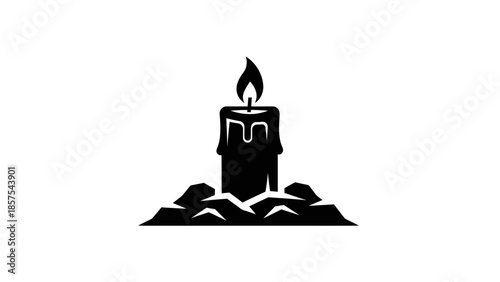 Black silhouette of a burning candle on a pile of rocks.