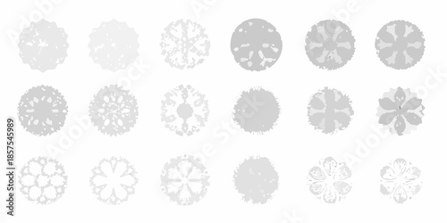 A collection of grayscale circular patterns resembling snowflakes or floral designs