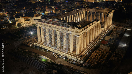 Obraz na plátně Aerial drone night shot of iconic illuminated Acropolis hill and the Parthenon a