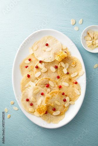 Homemade crepes with honey and almond