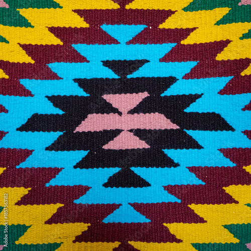 Traditional oriental Uzbek handmade colorful carpets at the bazaar in Uzbekistan in Tashkent