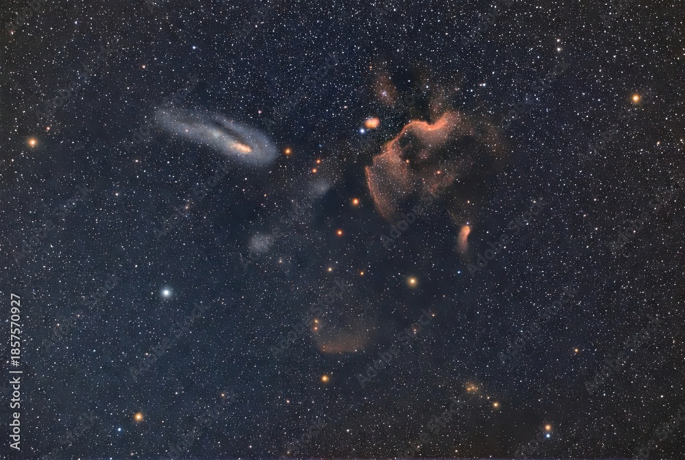 Fototapeta premium Deep cosmic vista showcasing a spiral galaxy, glowing nebulae, and countless
