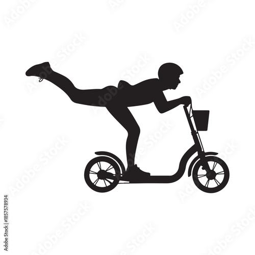 A silhouetted boy riding a scooter with a basket in front of him