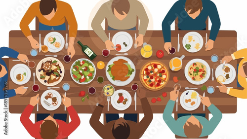 Aerial view of people enjoying a festive meal together at a long table.