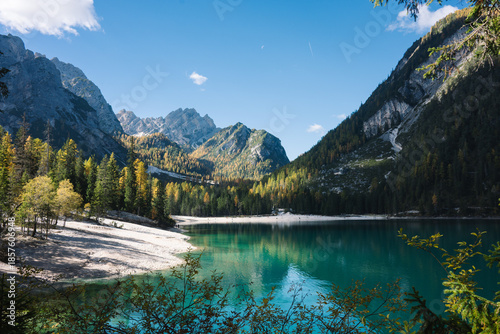 Mountain Lake Scene - Lago di Braies Italy Dolomites, Emerald green lake with mountains, alpine trees and alps landscapes - jigsaw puzzle and chocolate box perfect - sunny autumn fall day
