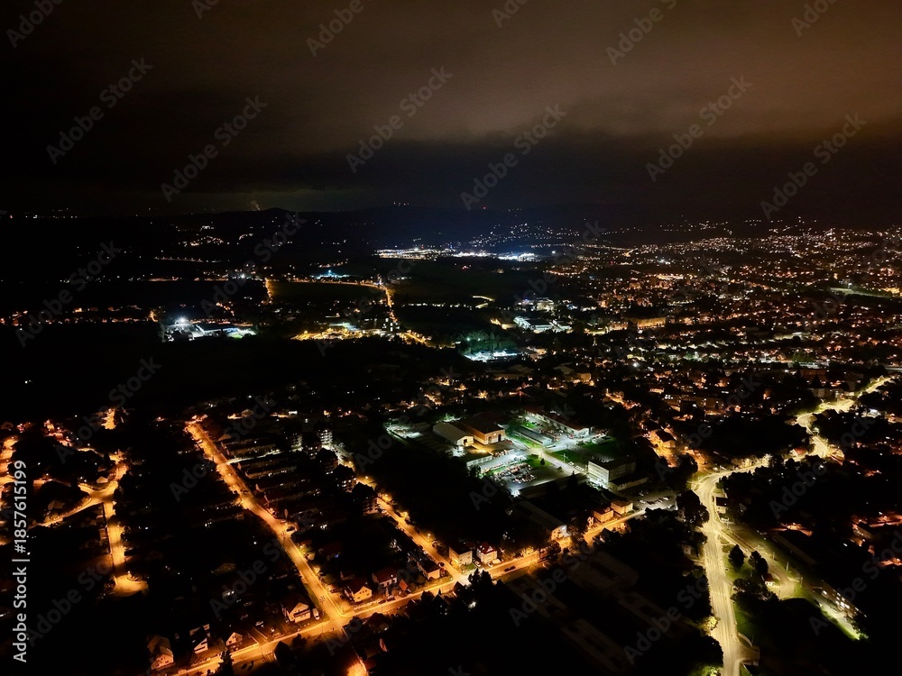 Obraz premium Suburban Road Networks At Night, Illuminated Neighborhood Roads For Navigation And Safety Planning