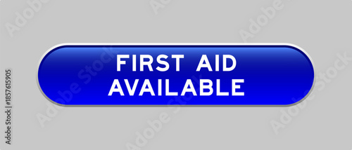 Blue color capsule shape button with word first aid available on gray background