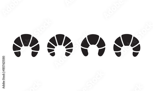 Four black croissants in a row