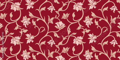 A close-up view of a red floral pattern with white flowers and vines on a red background