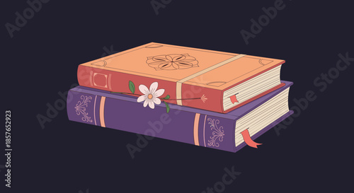 Stack of two vintage books with a flower on top.