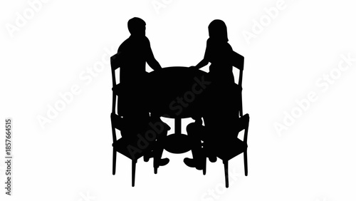 Silhouette of a couple sitting at a dining table with chairs.