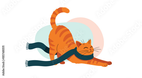 Playful orange striped cat stretching its body while wearing a long dark blue scarf against a minimalist soft colored background.